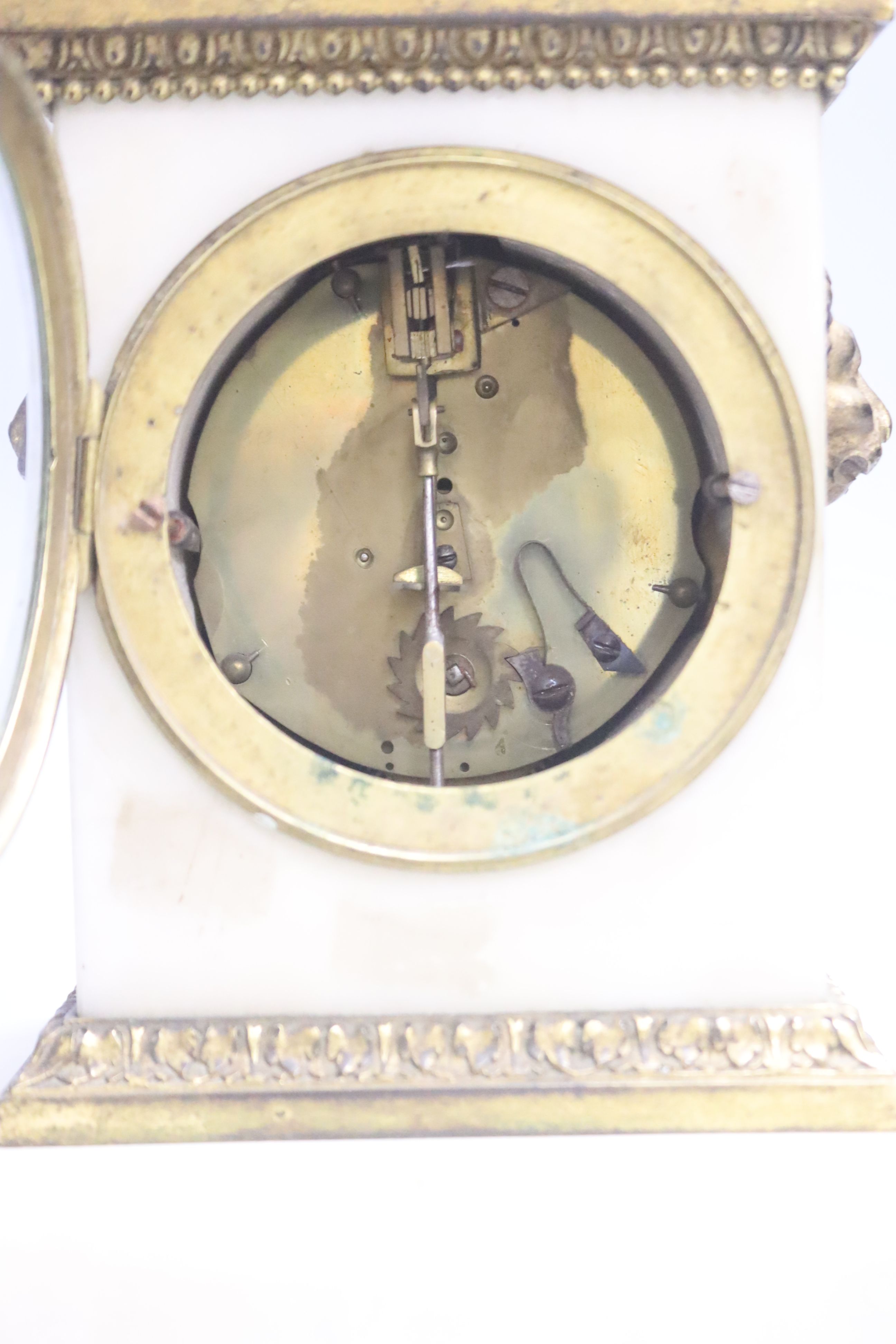 A 19th century bronze and alabaster mantel timepiece, height 28cm